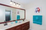 Master Bathroom Features Dual Sinks and a Walk in Shower